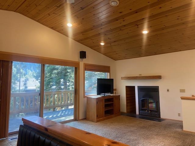 67 Hill Street Mammoth Lakes, CA 93546 - Photo 12 of 24 Unfurnished living room featuring lofted ceiling, carpet, wooden ceiling, a fireplace with flush hearth, and recessed lighting