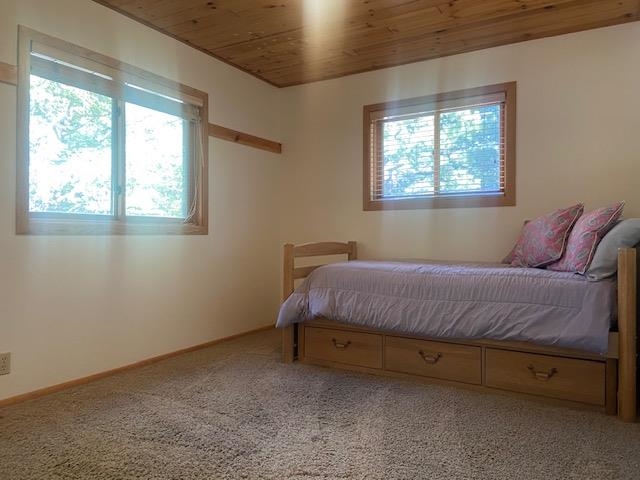 67 Hill Street Mammoth Lakes, CA 93546 - Photo 19 of 24 Carpeted bedroom with baseboards and wood ceiling