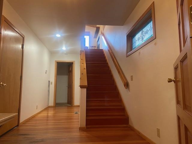 67 Hill Street Mammoth Lakes, CA 93546 - Photo 6 of 24 Stairway featuring wood finished floors and recessed lighting
