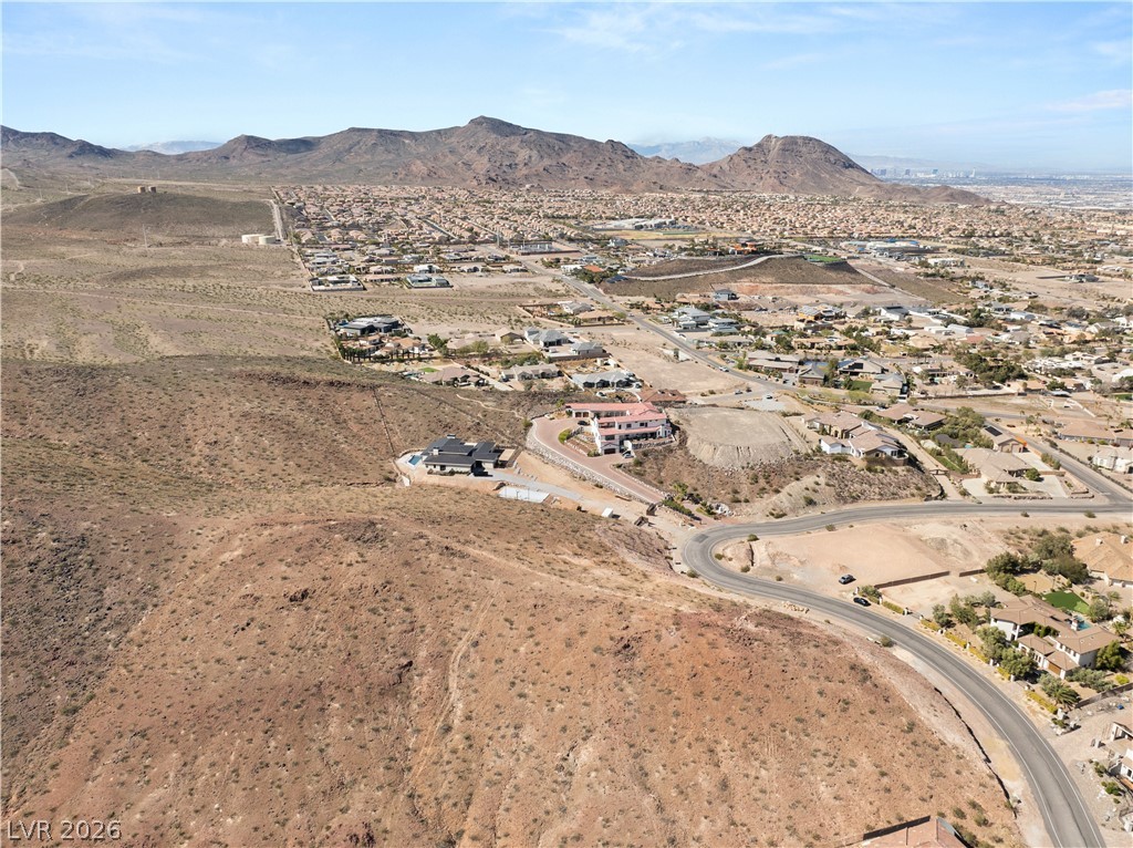 1153 Christian Road Henderson, NV 89002 - Photo 9 of 11 High desert panorama reveals sweeping mountain and city light views from this elevated residential area.