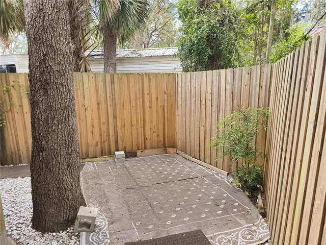 a kitchen with stainless steel appliances a stove and a microwave