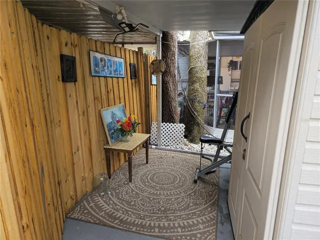 a bedroom with bed and a window