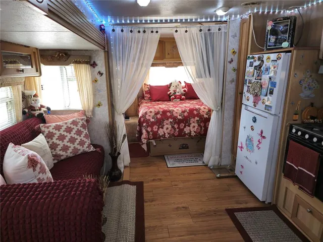 a view of a house with a flower garden