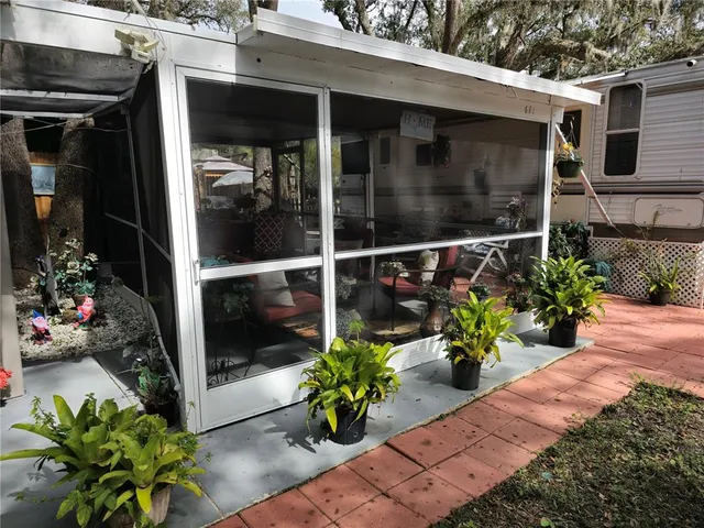 a view of a car park in front of house