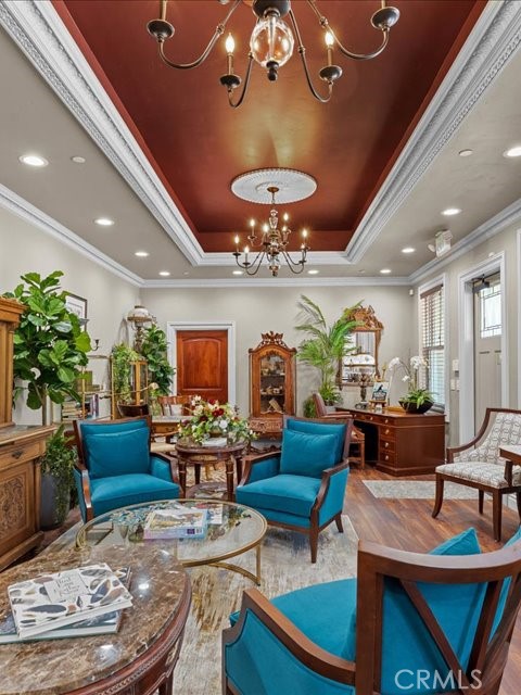 701 Rio Street Red Bluff, CA 96080 - Photo 27 of 72 a living room with furniture and a chandelier