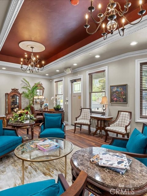 701 Rio Street Red Bluff, CA 96080 - Photo 28 of 72 a living room with furniture and a chandelier