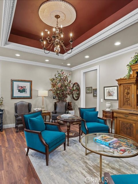 701 Rio Street Red Bluff, CA 96080 - Photo 31 of 72 a living room with furniture and a chandelier