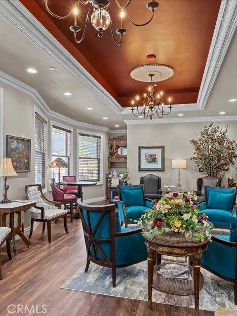 701 Rio Street Red Bluff, CA 96080 - Photo 33 of 72 a living room with furniture and a chandelier