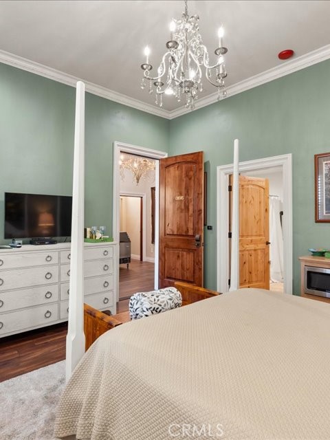 701 Rio Street Red Bluff, CA 96080 - Photo 37 of 72 a bedroom with a bed and a flat screen tv