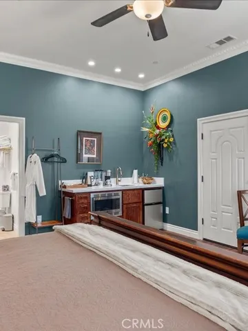 a kitchen with wooden cabinets and a stove top oven
