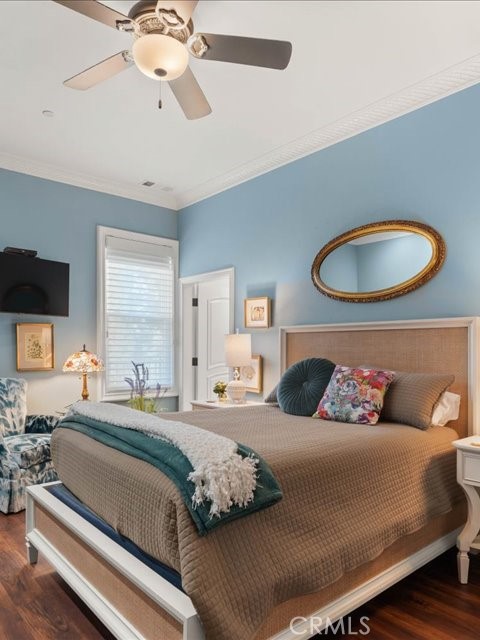 701 Rio Street Red Bluff, CA 96080 - Photo 46 of 72 a bedroom with a bed and a chandelier