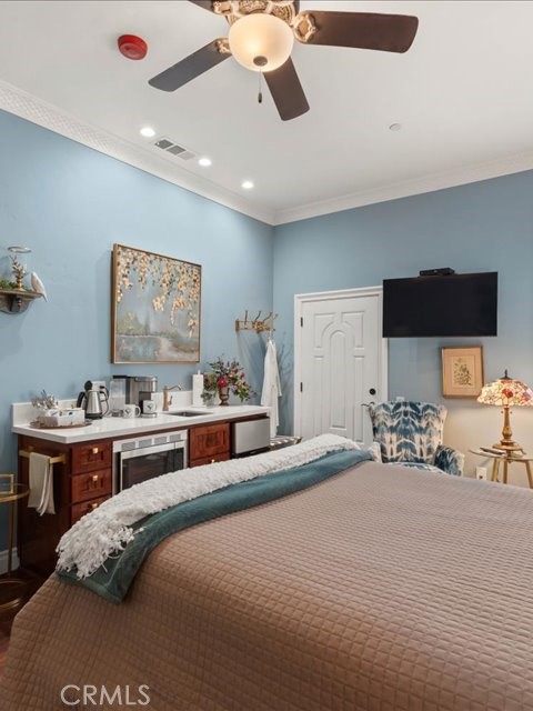 701 Rio Street Red Bluff, CA 96080 - Photo 47 of 72 a bedroom with a bed and a large mirror