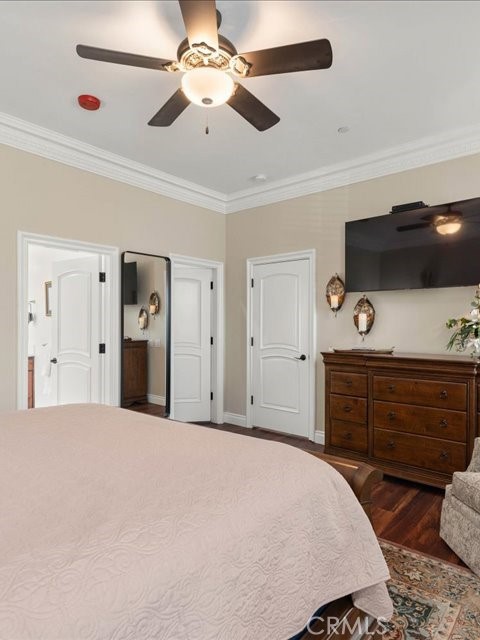 701 Rio Street Red Bluff, CA 96080 - Photo 66 of 72 a bedroom with a bed and a flat tv screen on dresser