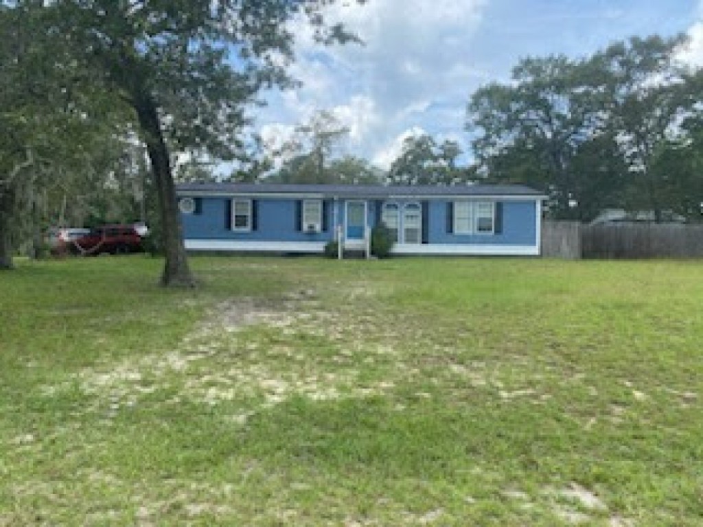 a house view with a garden space