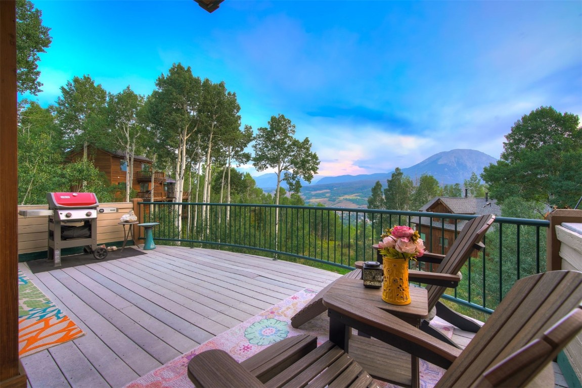 2210 Hamilton Creek Road Silverthorne, CO 80498 - Photo 11 of 50 a view of a deck with wooden floor and outdoor seating