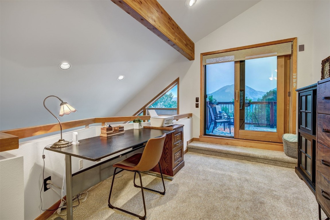 2210 Hamilton Creek Road Silverthorne, CO 80498 - Photo 23 of 50 a workspace with furniture and a window