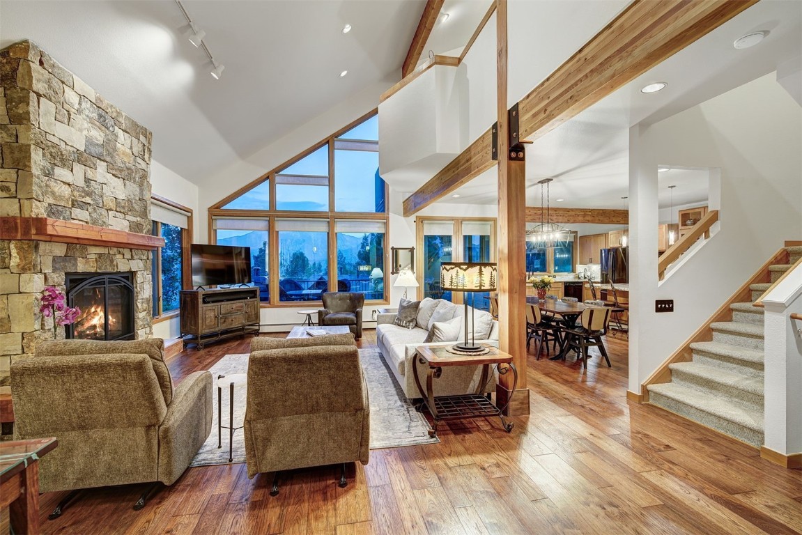 2210 Hamilton Creek Road Silverthorne, CO 80498 - Photo 4 of 50 a living room with furniture and a fireplace