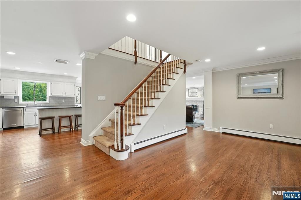 856 Stonewall Court Franklin Lakes, NJ 07417 - Photo 3 of 26 a view of an entryway with wooden floor