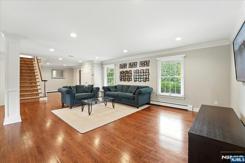856 Stonewall Court Franklin Lakes, NJ 07417 - Photo 4 of 26 a living room with furniture and a wooden floor