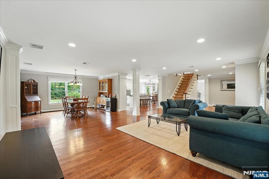 856 Stonewall Court Franklin Lakes, NJ 07417 - Photo 10 of 26 a living room with furniture and wooden floor