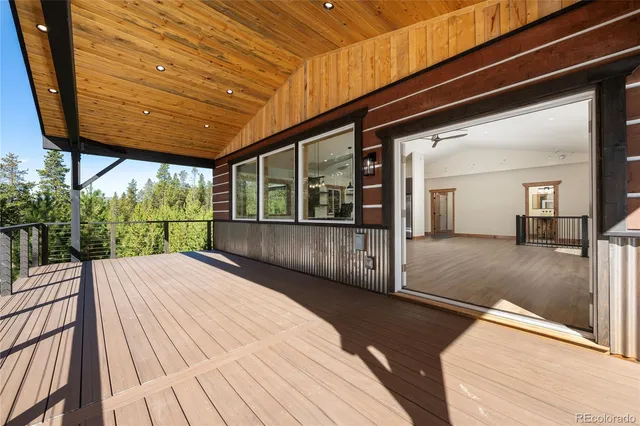 a balcony with wooden floor