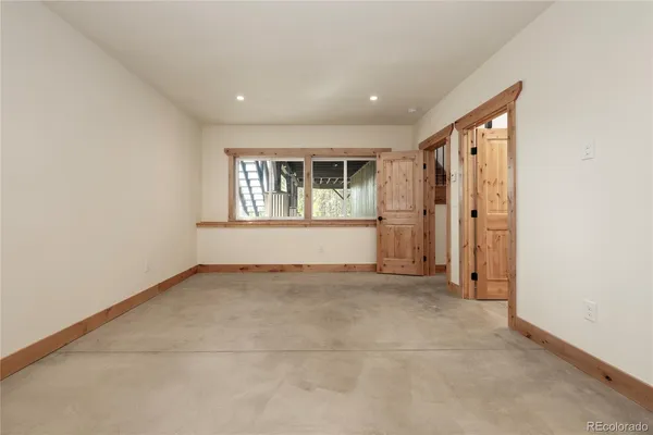 an empty room with windows