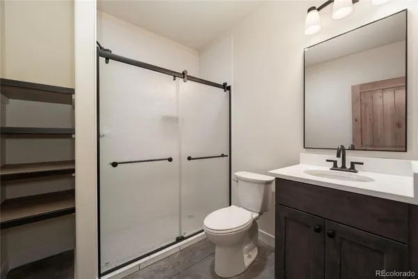 an empty room with closet area