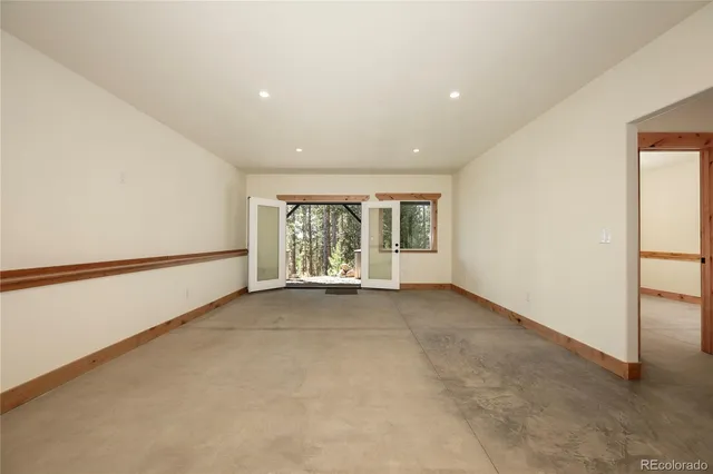 a view of a kitchen cabinets a sink and a window