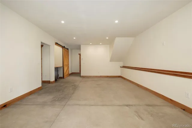 a view of a porch with wooden floor and outdoor space