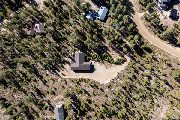 a view of a back yard of the house