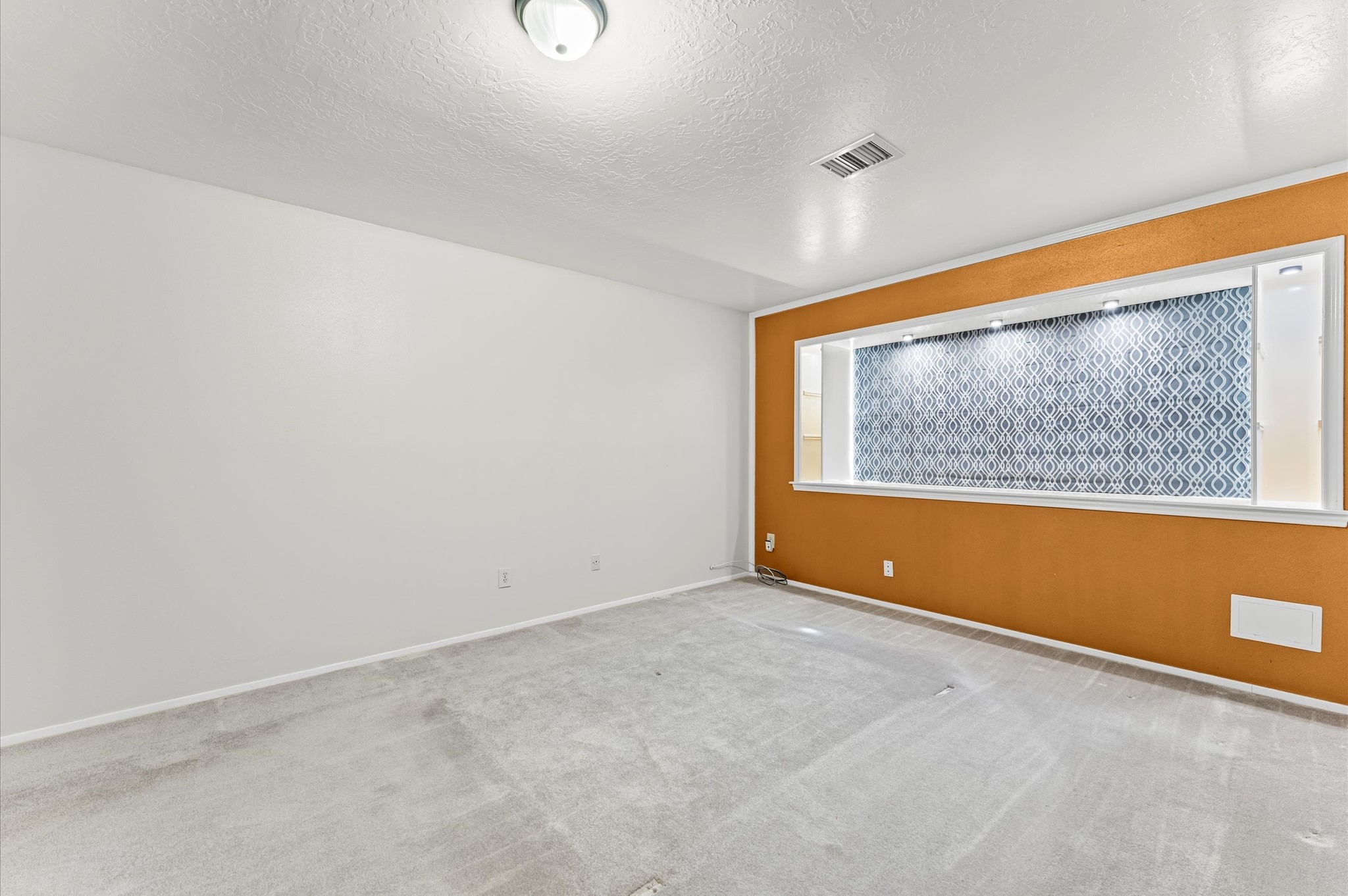 17015 Sky Blue Place Houston, TX 77095 - Photo 14 of 25 a view of an empty room with a window