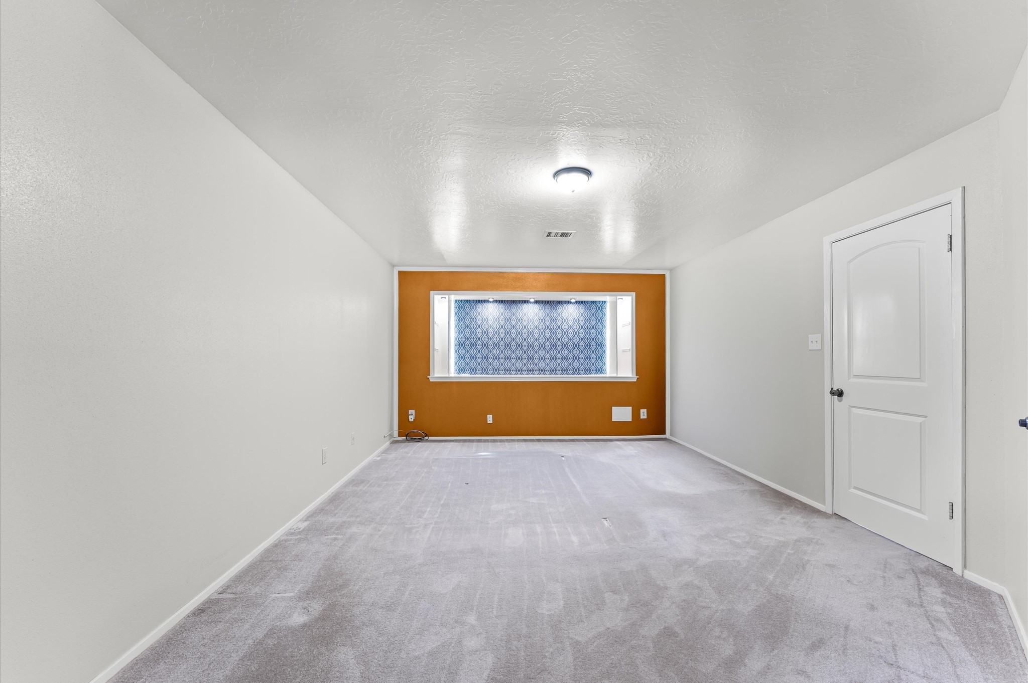 17015 Sky Blue Place Houston, TX 77095 - Photo 15 of 25 a view of an empty room with a window