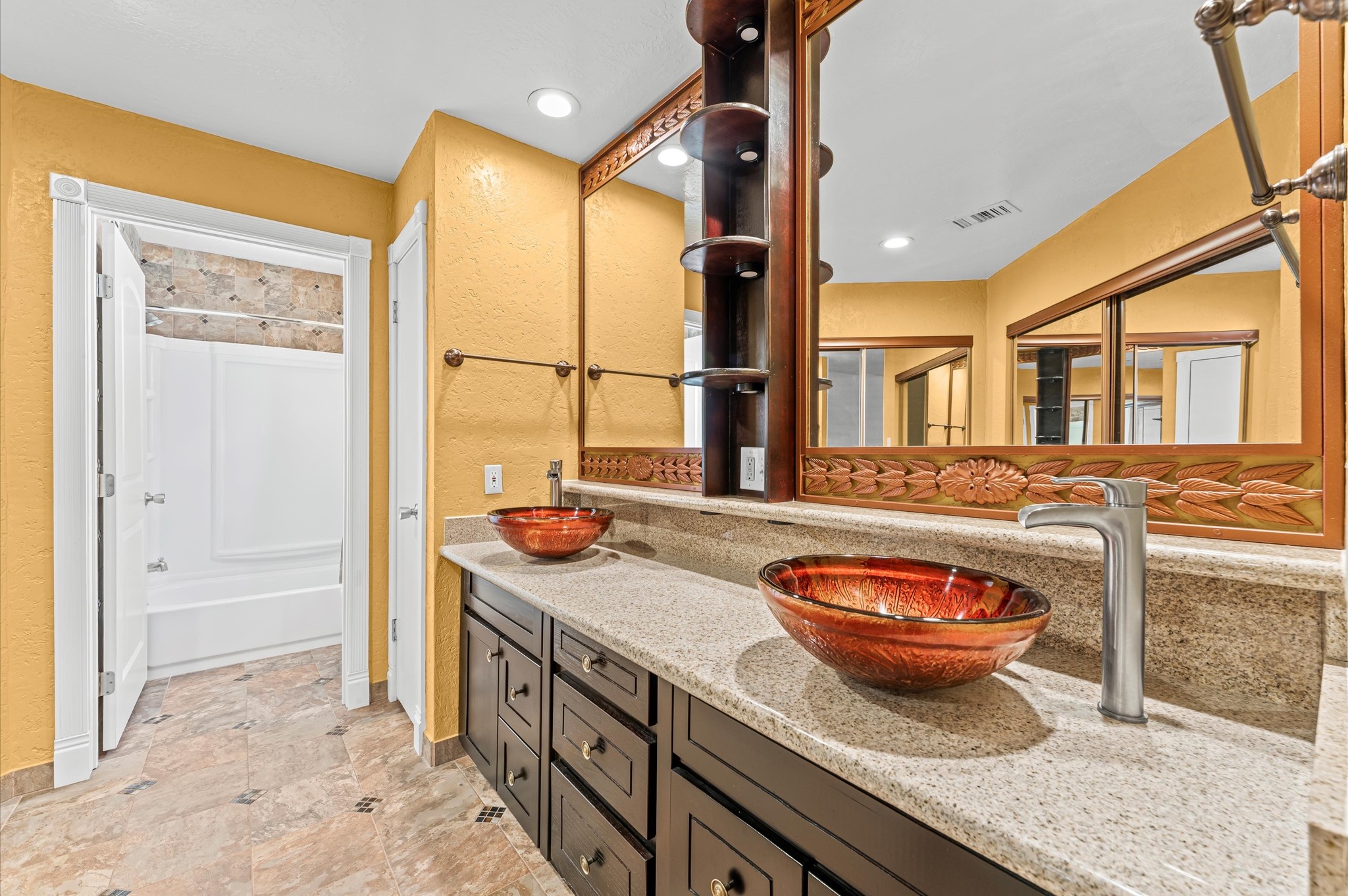 17015 Sky Blue Place Houston, TX 77095 - Photo 16 of 25 a bathroom with a granite countertop sink a toilet and shower