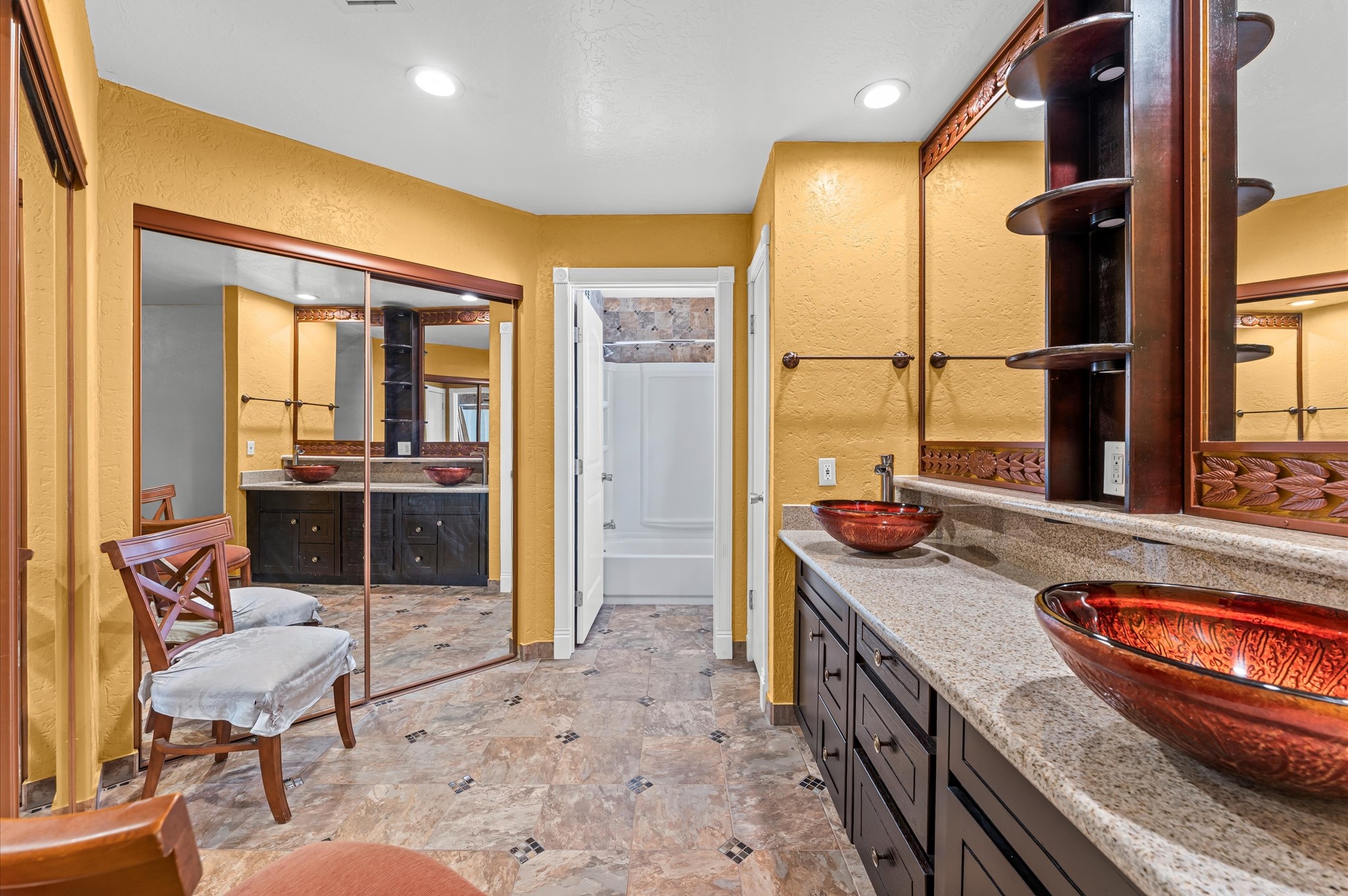 17015 Sky Blue Place Houston, TX 77095 - Photo 18 of 25 a spacious bathroom with a granite countertop sink and a mirror