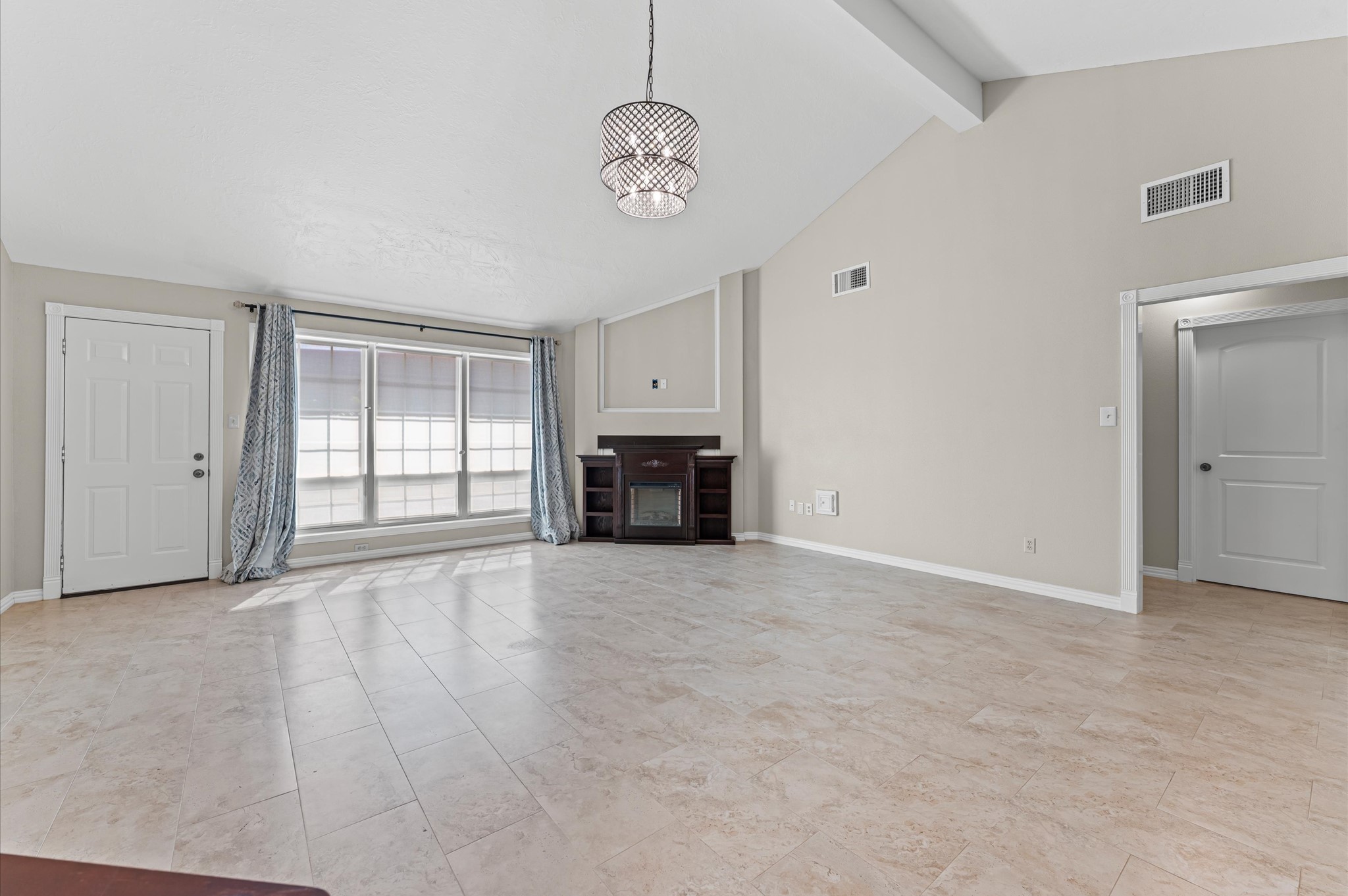 17015 Sky Blue Place Houston, TX 77095 - Photo 6 of 25 a view of an empty room with a window