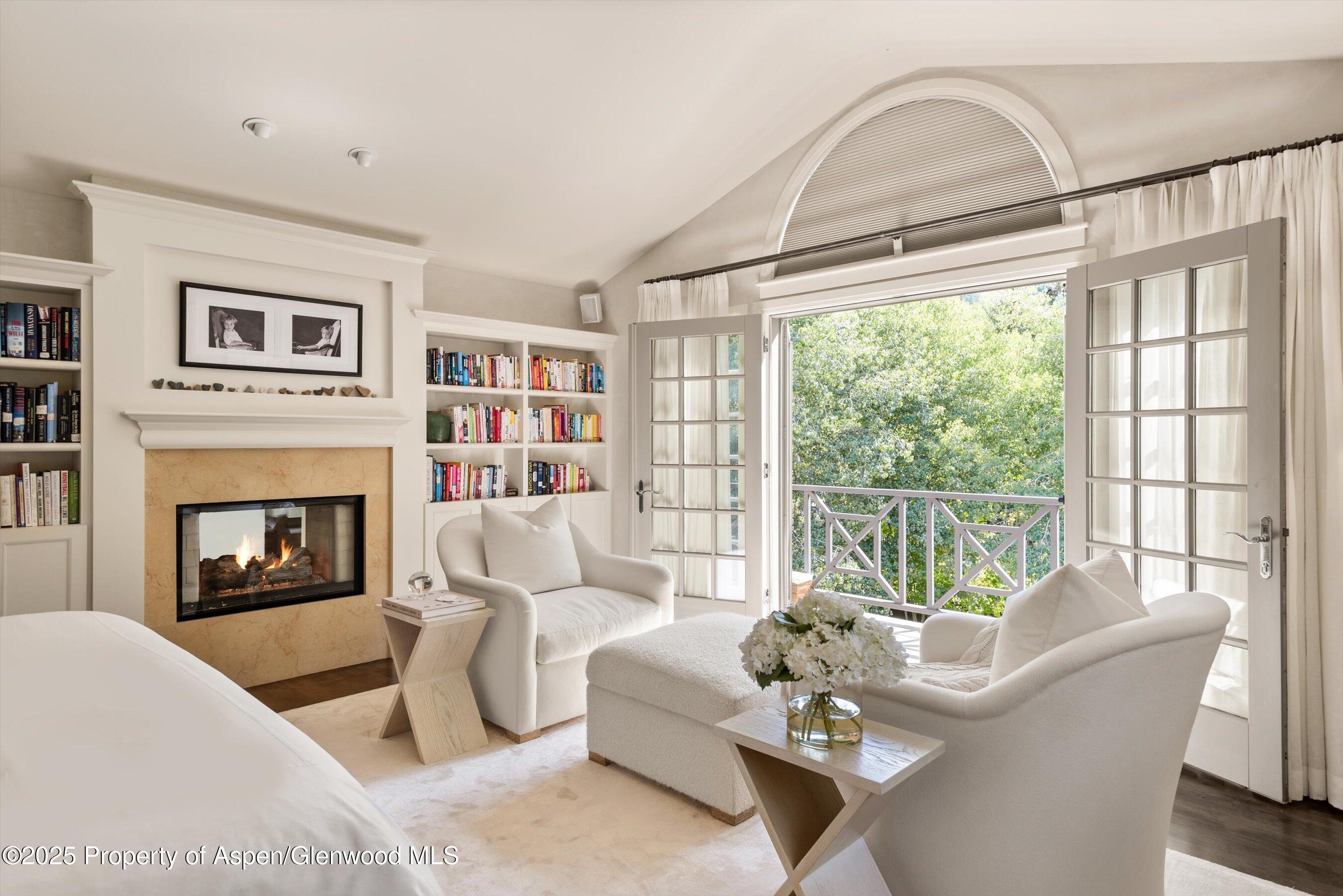 42 Northway Drive Aspen, CO 81611 - Photo 16 of 37 a living room with furniture and a fireplace