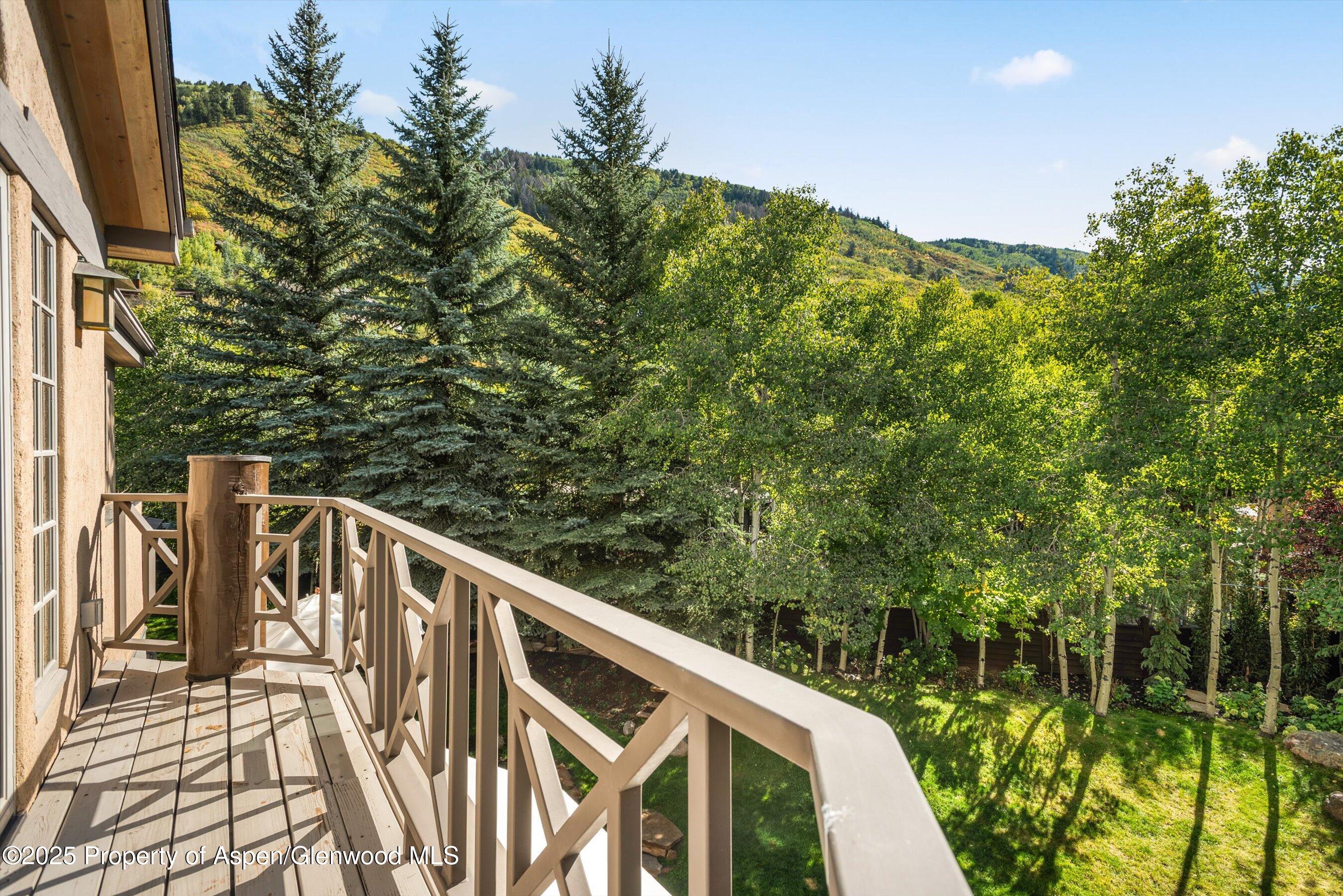 42 Northway Drive Aspen, CO 81611 - Photo 21 of 37 a view of balcony with wooden floor and fence