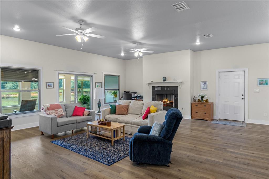 1461 B VZ County Road Ben Wheeler, TX 75754 - Photo 7 of 40 a living room with furniture fireplace and flat screen tv