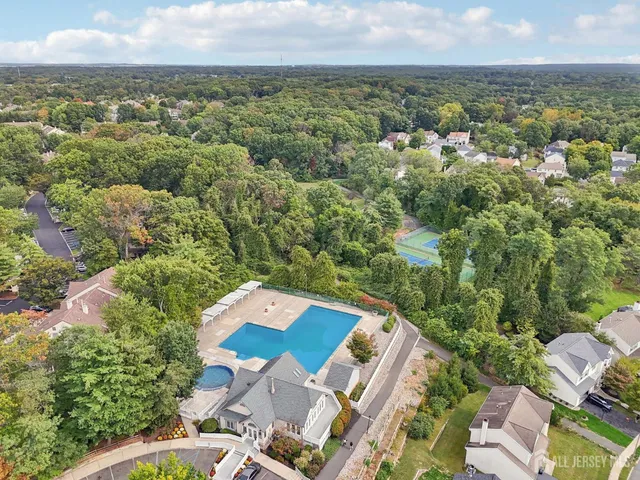 an aerial view of a city with lots of residential buildings