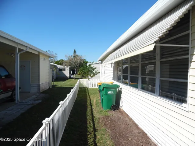 a house view with a garden space