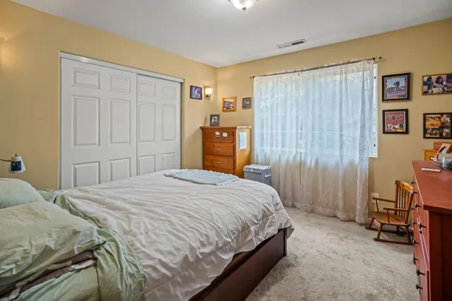 a view of a livingroom with furniture and windows