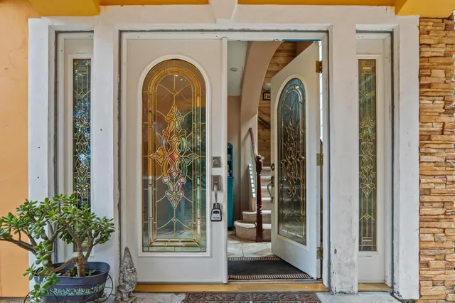 a view of a entryway door of the house