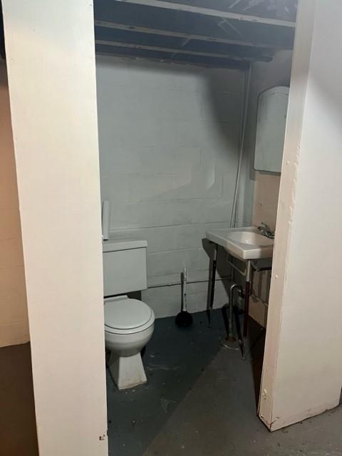 1040 5th Street Baden, PA 15005 - Photo 17 of 19 a bathroom with a toilet and a sink