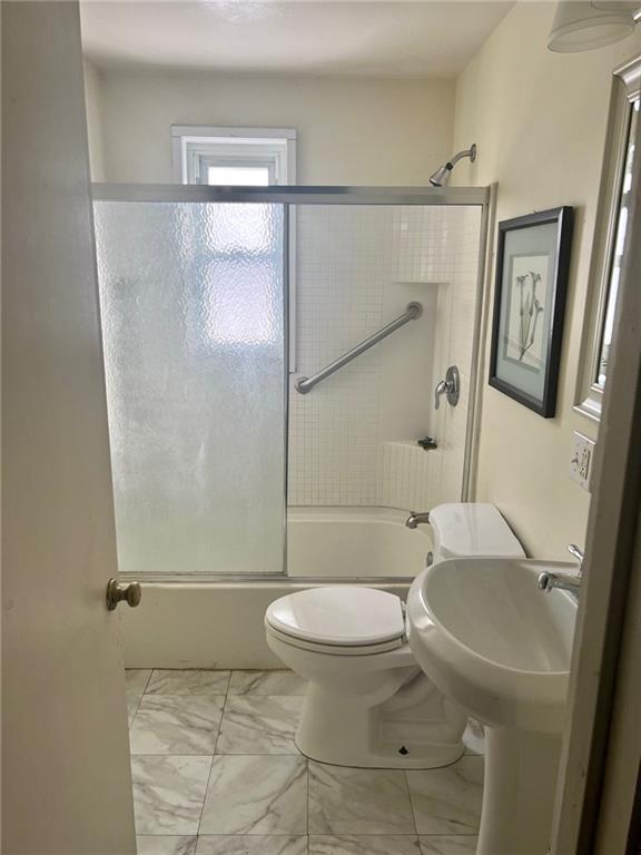 1040 5th Street Baden, PA 15005 - Photo 10 of 19 a bathroom with a toilet and a shower