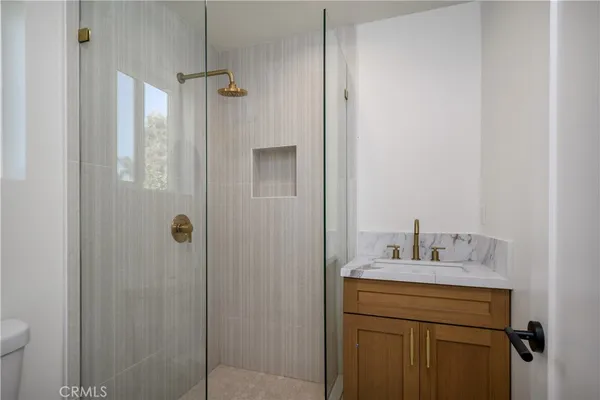 a bathroom with a sink and mirror