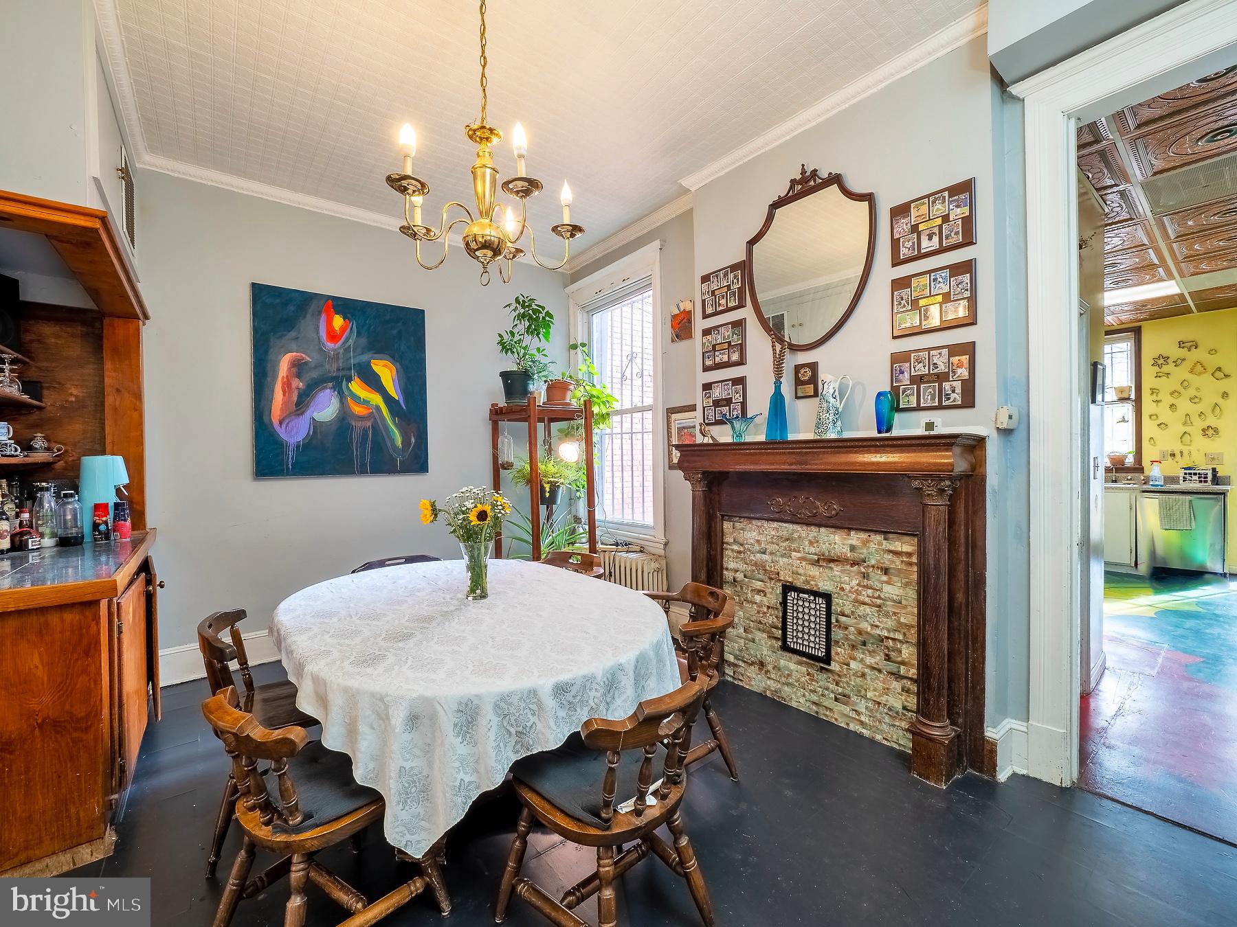 116 U Street Northwest Washington, DC 20001 - Photo 15 of 49 Dining room with another tiled fireplace wall