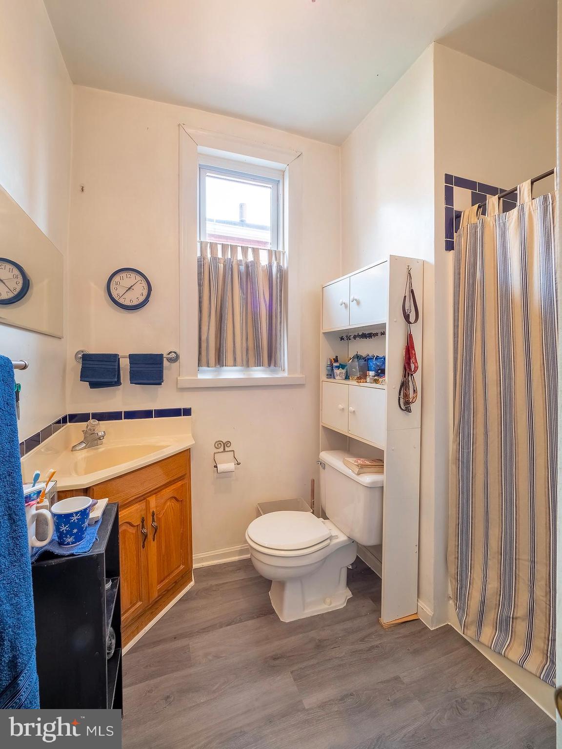 116 U Street Northwest Washington, DC 20001 - Photo 27 of 49 Full bath in the hall on the bedroom level