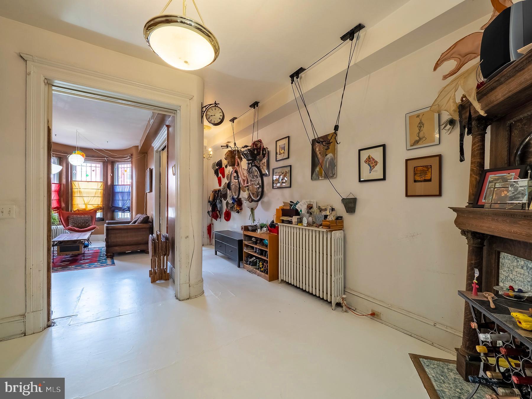 116 U Street Northwest Washington, DC 20001 - Photo 10 of 49 Entryway opens into large receiving room