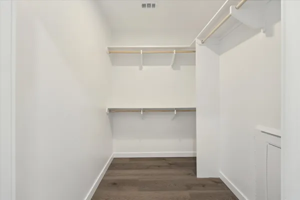 a view of an empty walk in closet