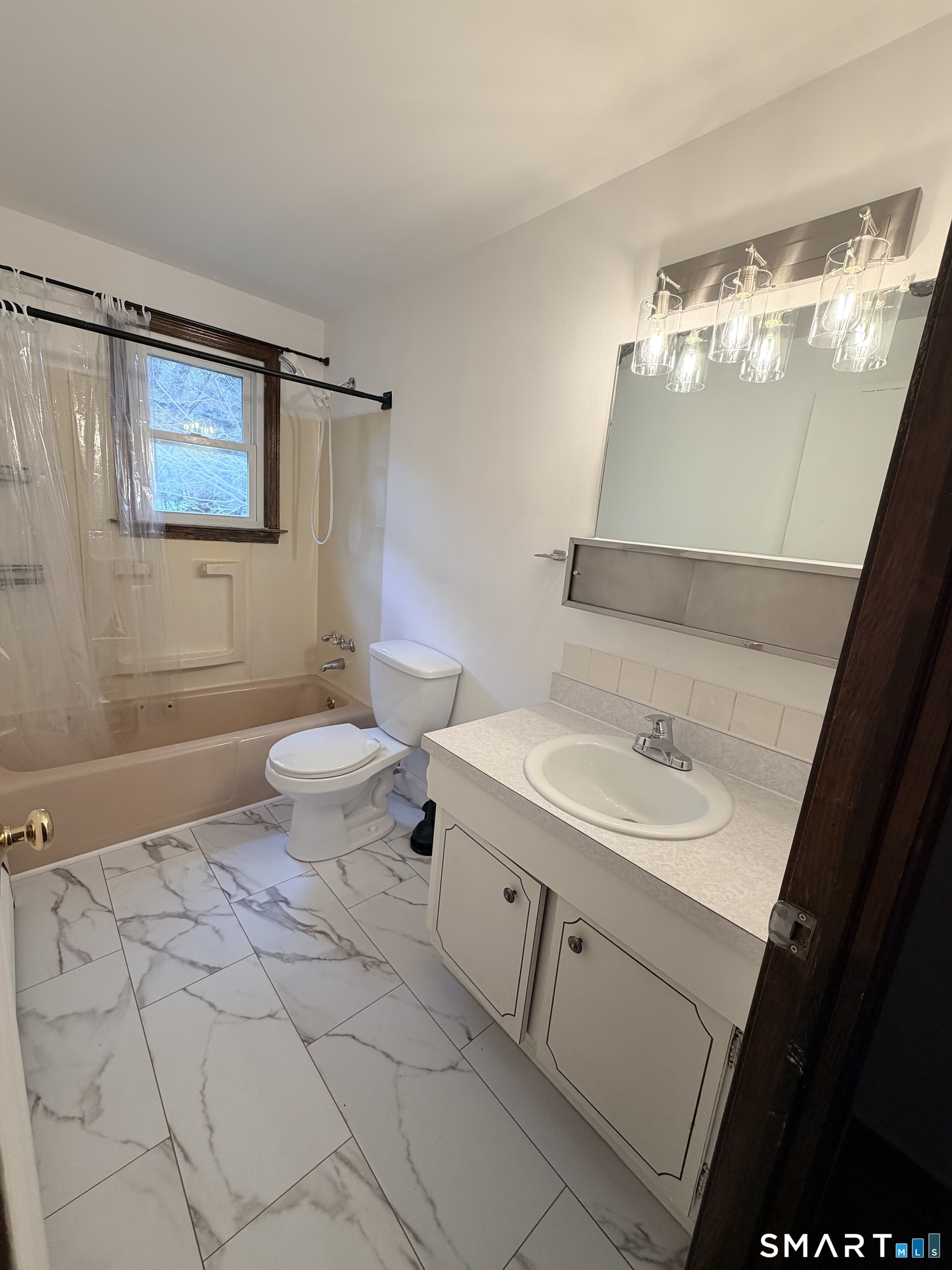 195 Wall Street Hebron, CT 06248 - Photo 11 of 23 a bathroom with a sink toilet and mirror